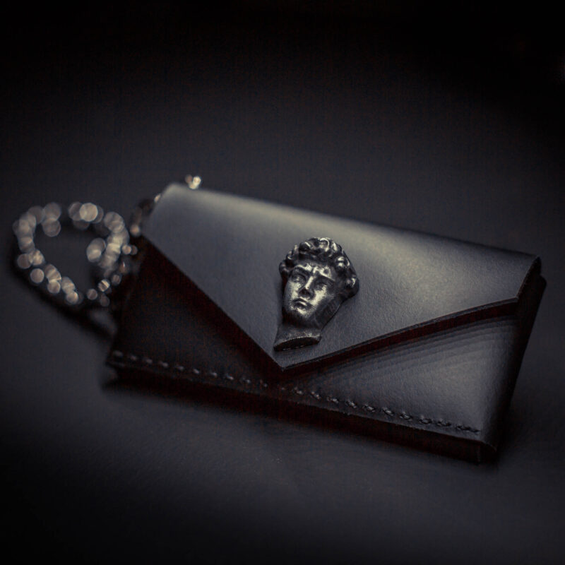 A handcrafted Italian leather belt bag inspired by Michelangelo’s David - functional, versatile, and customizable with your own engraving.